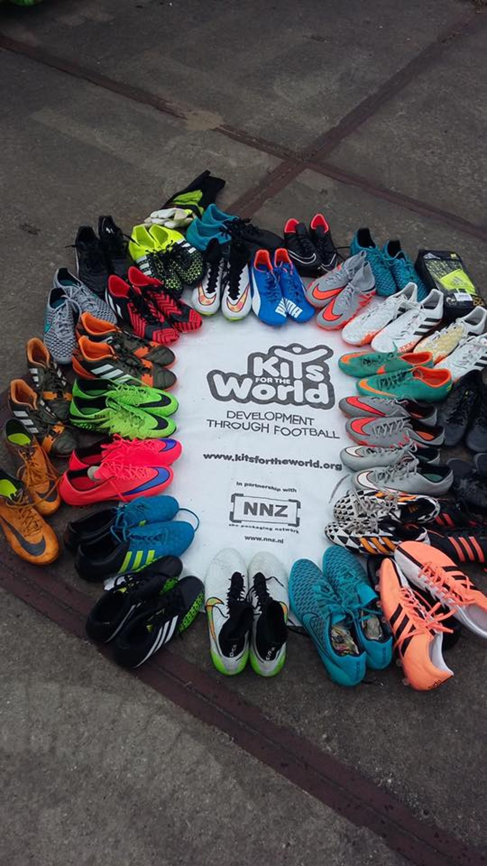 Donated football boots to kits for the world
